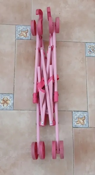 Carrito de juguete rosa