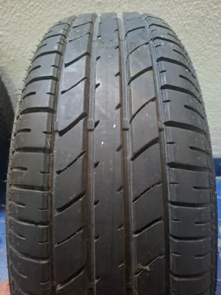 Rueda Bridgestone 195/65R15 8mm dibujo +Llanta 15"