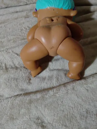 Muñeca bebé negrita con diadema