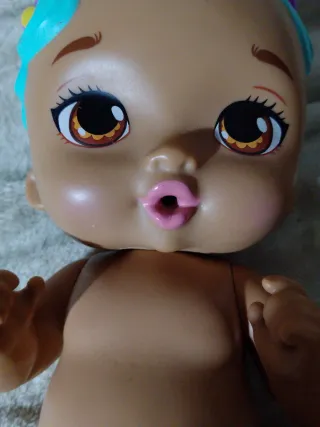 Muñeca bebé negrita con diadema