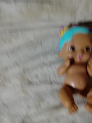 Muñeca bebé negrita con diadema