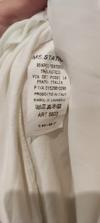 Vestido gasa blanco con cinturón rosa