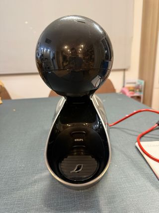 Cafetera Dolce Gusto Negra y Plateada