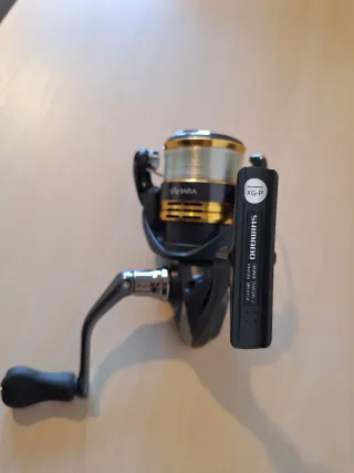 Carrete pesca Shimano 2500SHG con sedal 0.18 nuevo