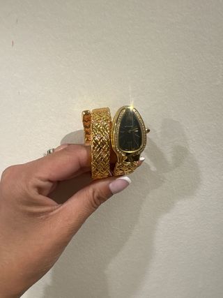 Reloj Serpiente Dorado con Bisel Diamantes