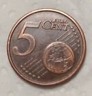 500 Liras Italia 1973 y 5 centimos de 2002