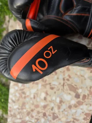 Guantes de boxeo Outshock negros y naranjas