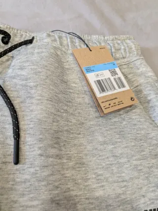 nike tech pantalón gris talla m con etiqueta
