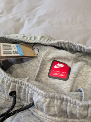 nike tech pantalón gris talla m con etiqueta
