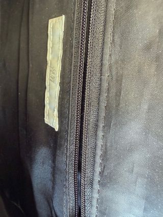 Bolso clutch beige cadena dorada