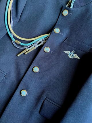 Traje de comunión azul con ancla