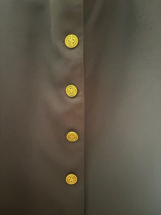 Chaqueta traje Semana Santa negra y dorada.