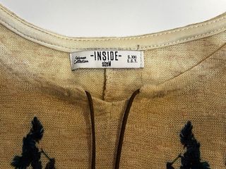 Blusa asimétrica con estampado étnico