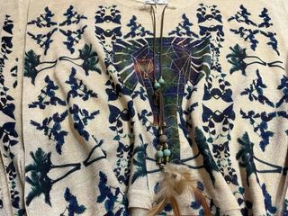 Blusa asimétrica con estampado étnico