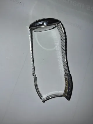 Reloj antiguo metal