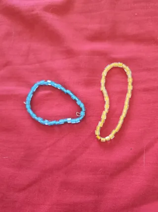 Pulseras mariquitas azules y plateadas