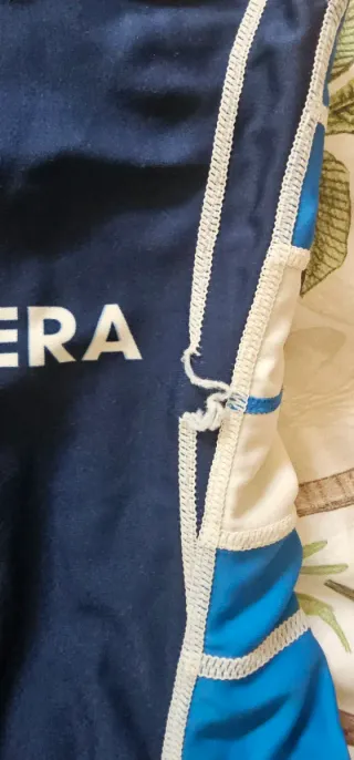 Mono de triatlón azul y blanco