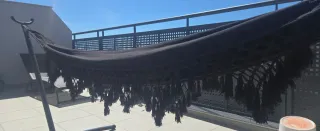 Hamaca de tela y metal negra