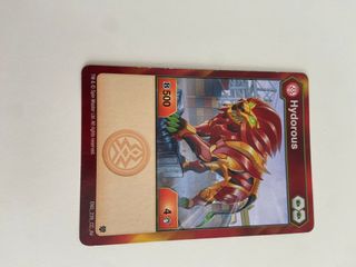 Lote 10 Bakugan con le loro carte, tabella e magneti.