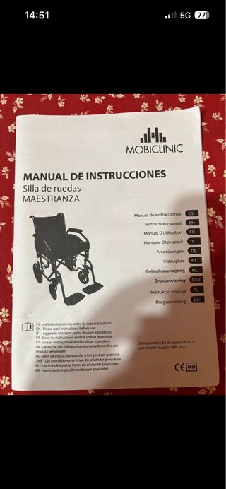 Sedia a rotelle pieghevole blu