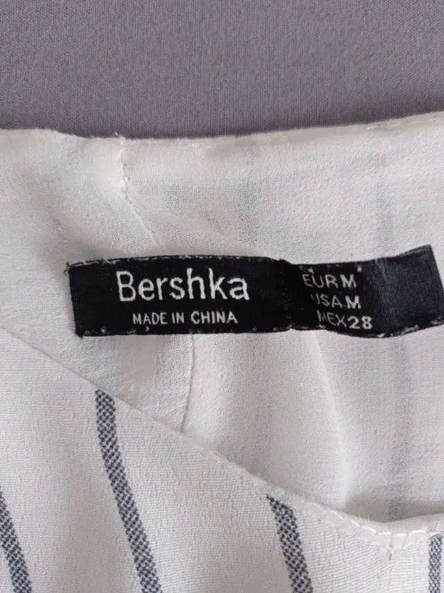 Mini abito spalle scoperte a righe