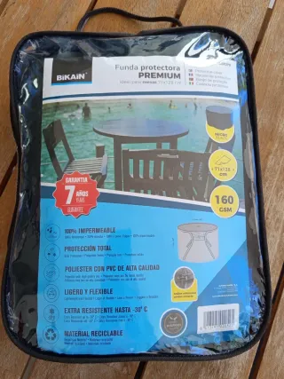 Mesa redonda exterior con 4 sillas (funda incluida