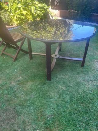 Mesa redonda teka y 6 sillas madera