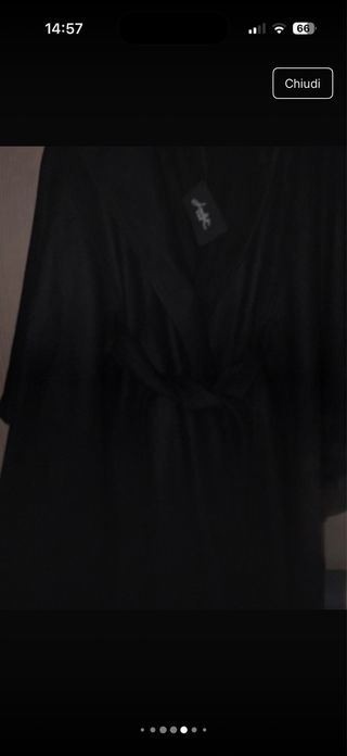 Capotto poncho nero con frange
