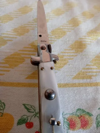 Coltellini in cuoio e metallo