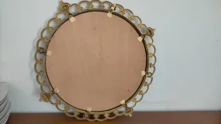 Espejo decorativo dorado con marco