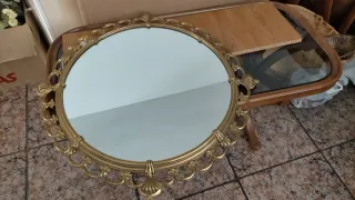 Espejo decorativo dorado con marco