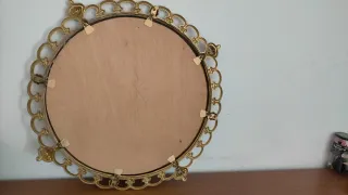 Espejo decorativo dorado con marco