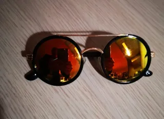 Occhiali da sole uomo rotondi neri e oro