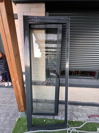 Puerta aluminio climalit con marco