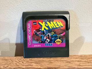 Sega Game Gear con juego x-men y adaptador