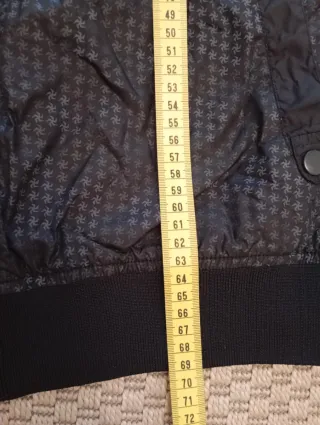 Cazadora impermeable SFERA