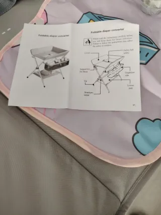 Cambiador de bebé plegable nuevo en sú caja