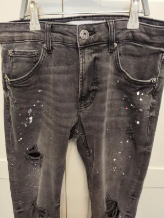 Pantalón vaquero gris roto talla 36