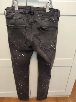 Pantalón vaquero gris roto talla 36