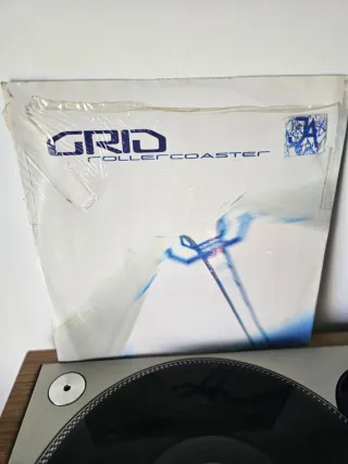 3  Vinilos del grupo GRID