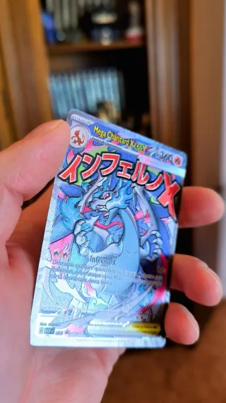 HERMOSO CHARIZARD Y ORICORIO