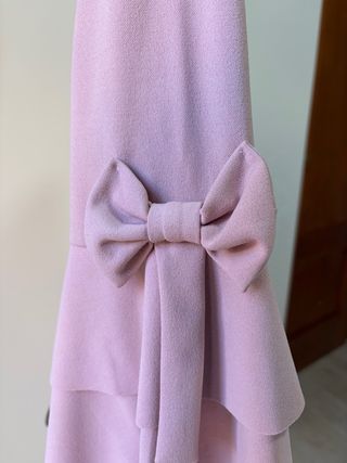Vestido rosa pastel de volantes y lazos