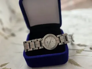 Reloj de pulsrera de cuero,i otro de acero