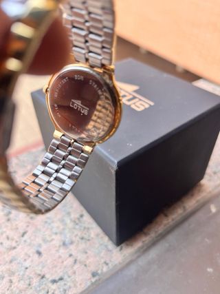 Reloj Lotus Oro y Plata