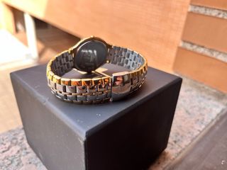 Reloj Lotus Oro y Plata