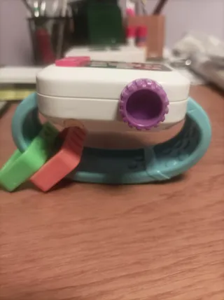 Fisher-Price Reloj bebé en Portugués