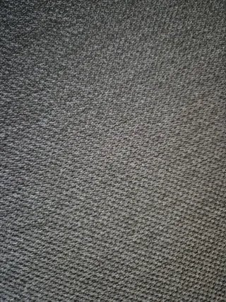 Sofá de tela gris como nuevo