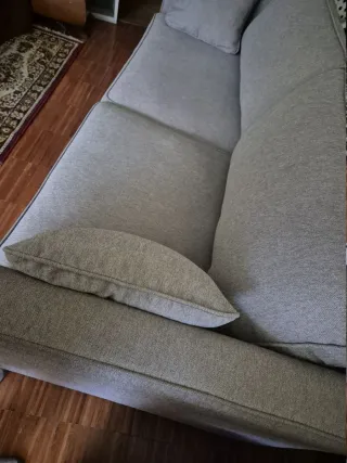 Sofá de tela gris como nuevo