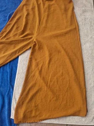 Mono T U . Medidas en descripción