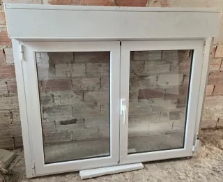 Ventanas de PVC y Aluminio con persiana.